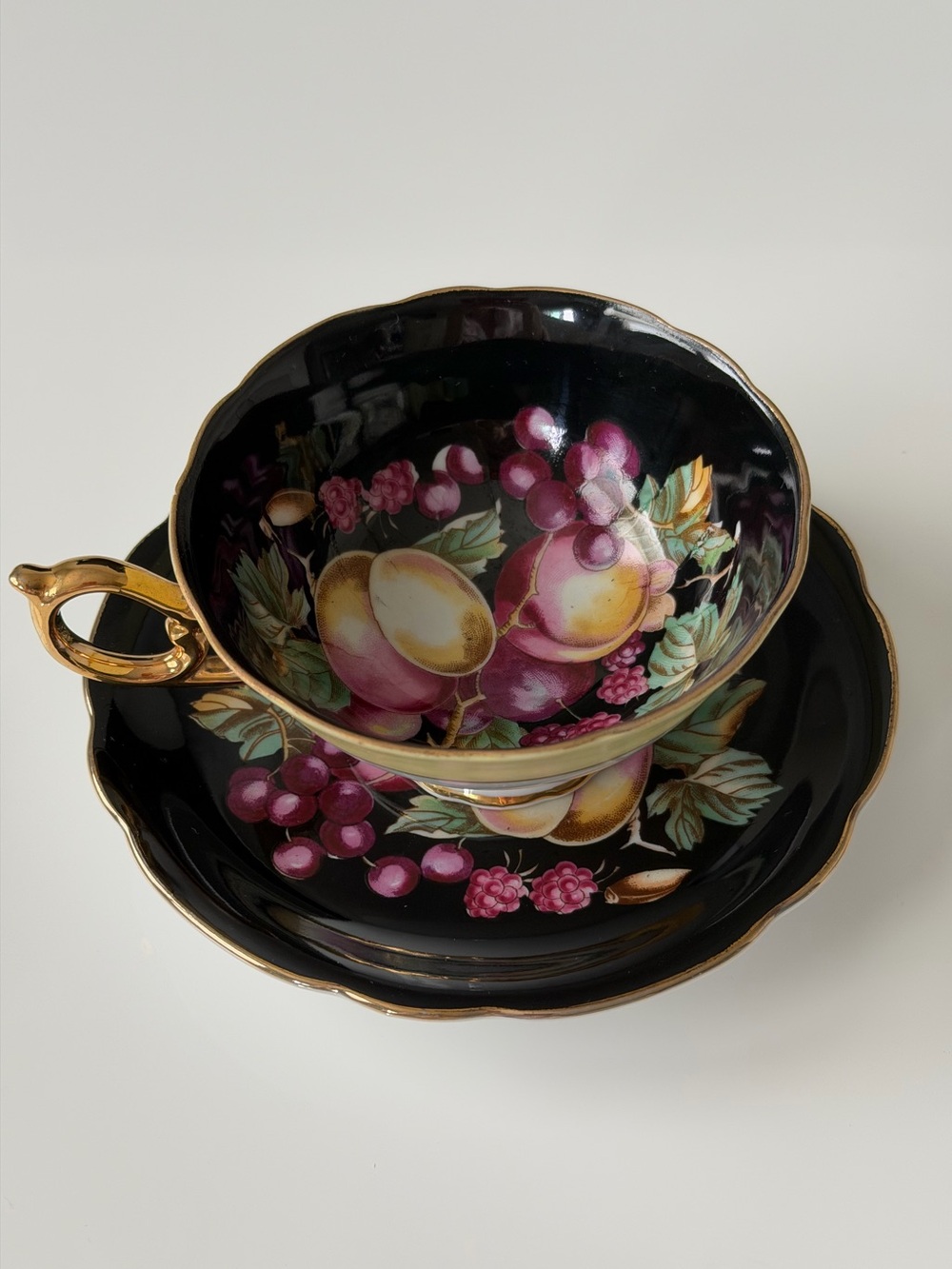 Japan Royal Sealy Vintage Porcelain Black & Gold Fruit Motif Teacup & Saucer Set